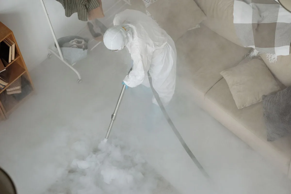 Biohazard cleanup technician in protective equipment, Haverhill, MA